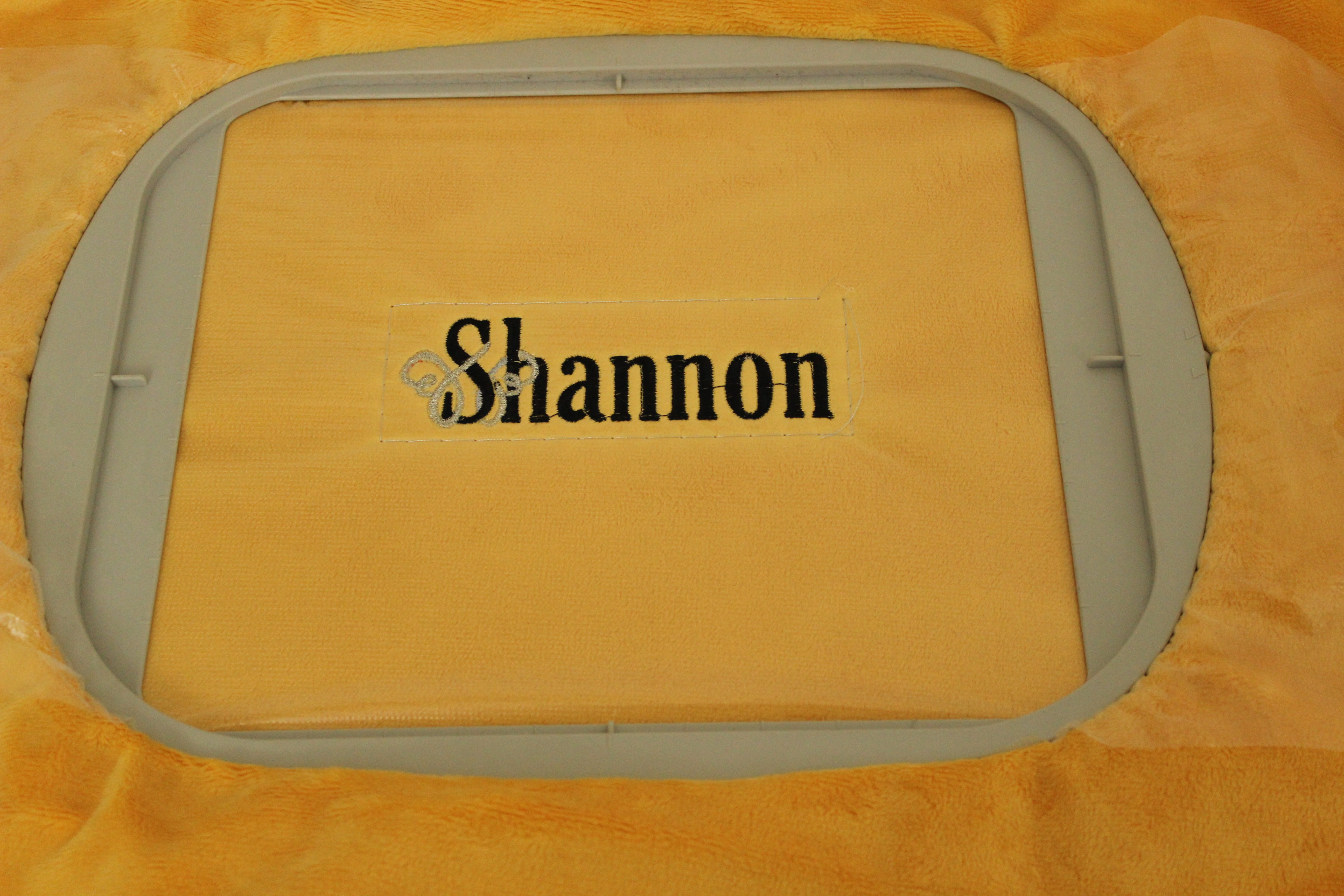 Machine Embroidery on Cuddle® in Mango ("Shannon" Logo digitized by Linda White, Sales Rep