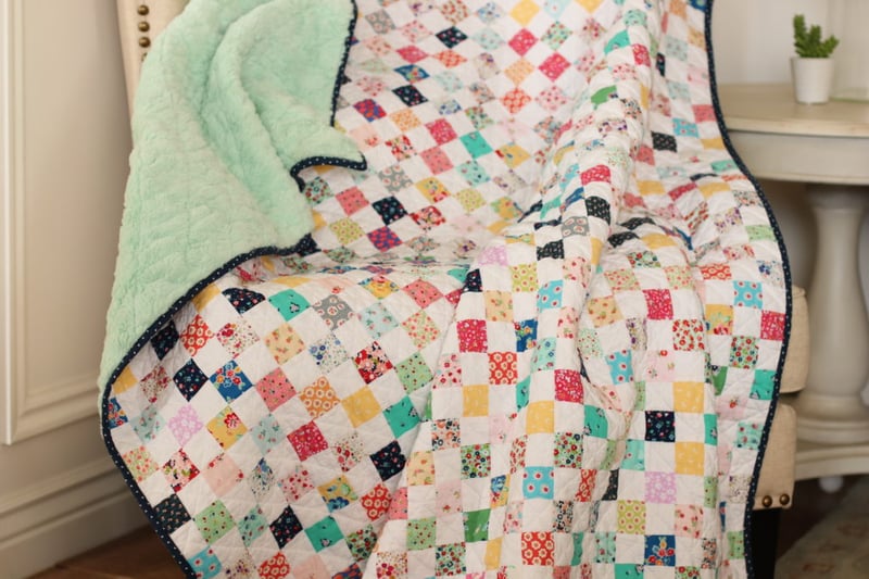 Quilt Story Cuddle quilt with pieced cotton front and Luxe Cuddle Luna in Honeydew for backing