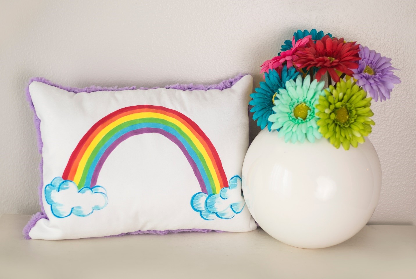 Rainbow Painted Pillow - from Pretty Painted Pillows DIY for Spring in Cuddle® Suede and Luxe Cuddle®