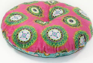 pink pillow with button finished